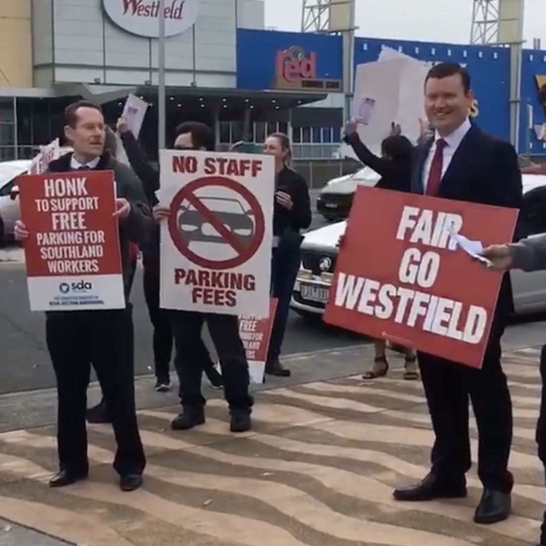 Angry protest at parking fee post image